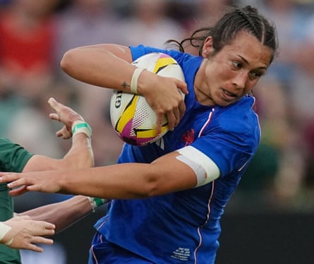 Manaé Feleu of France is tackled by Nadine Roos of South Africa