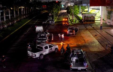 Police work at a crime scene in Acapulco in 2018. Many regional and state forces are accused of colluding with the crime organizations they are supposed to be confronting.