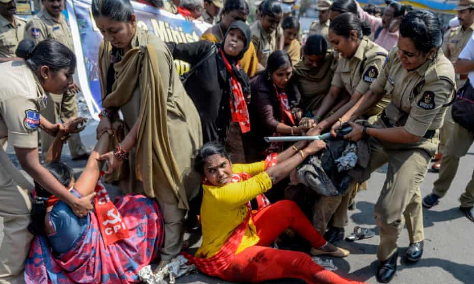 Police attempt to arrest protesters in Hydrabad after the protests in Delhi