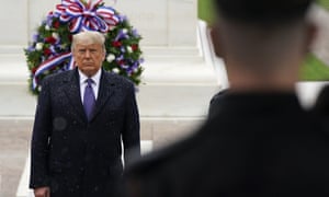 Donald Trump participates in a Veterans Day observance at Arlington national cemetery in Virginia on 11 November.