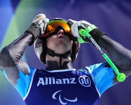 Russia’s Aleksei Bugaev reacts after claiming a bronze medal the men’s downhill standing competition at Cortina d’Ampezzo
