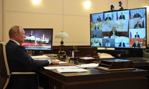 Vladimir Putin during a video conference with Russian government officials.