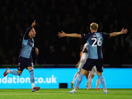 Cauley Woodrow celebrates after scoring