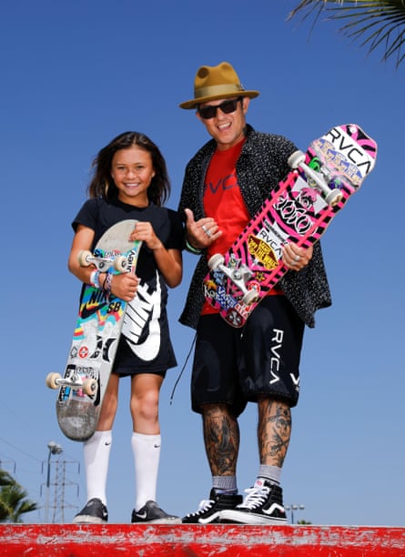 Skateboarder Sky Brown with US pro skateboarder Christian Hosoi at a skatepark in Huntington Beach, California, September 2019