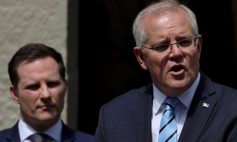 Australian prime minister Scott Morrison speaks to the media alongside immigration minister Alex Hawke