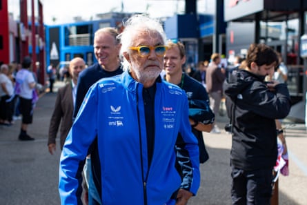 Flavio Briatore walks in the paddock at Zandvoort.