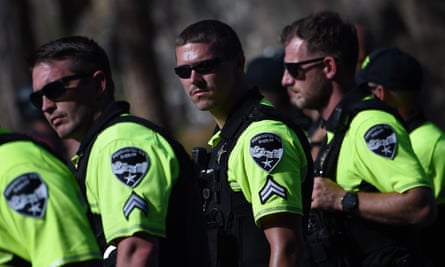 Sheriff’s deputies look on as protesters block the road to Mount Rushmore National Monument in South Dakota.
