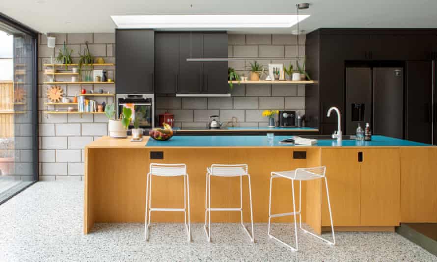 Bare concrete blocks and jumbo terrazzo in the kitchen extension