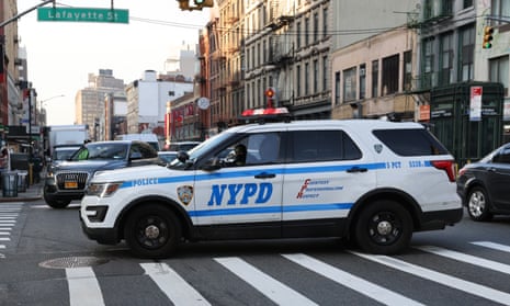 NYPD car driving in New York City