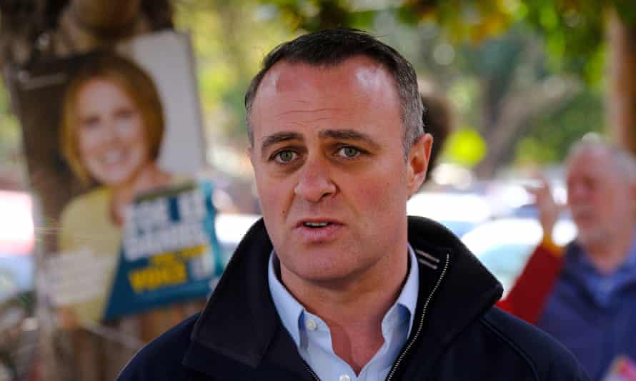 Liberal candidate Tim Wilson is seen outside an early voting centre in Goldstein in Melbourne.