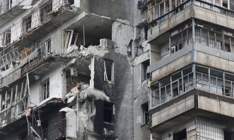 A damaged block of flats in Mariupol as fighting including tank and machine gun battles go on in the centre of the city. 