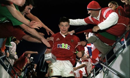 O’Driscoll takes the plaudits from fans at the Gabba in Brisbane after a man-of-the-match display in the 29-13 win in the first Test of the 2001 Lions tour of Australia.