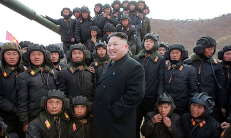 North Korean Leader Kim Jong Un with tank crews, in an undated photograph.