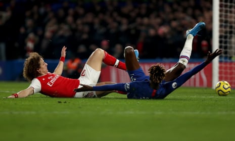 David Luiz cleans out Tammy Abraham. ‘It is an underrated David Luiz trait, in among the crossfield punts, the dribbles, the flowing mane. He’s also a solid B+ clogger.’