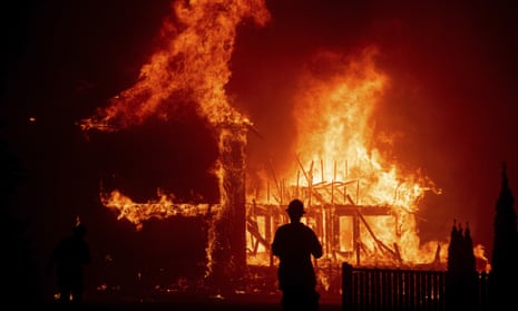 A home burns as the Camp Fire rages through Paradise, California on 8 November 2018.
