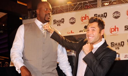 Shaquille O’Neal and Oscar De La Hoya strike a pose at Planet Hollywood in Las Vegas, Nevada