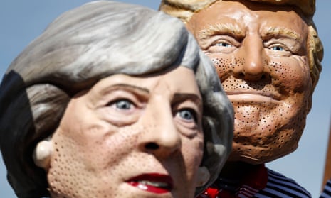 Masks of Theresa May and Donald Trump