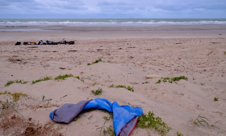 Belongings of people who tried the cross the Channel last month, on a beach at Willemeux, France