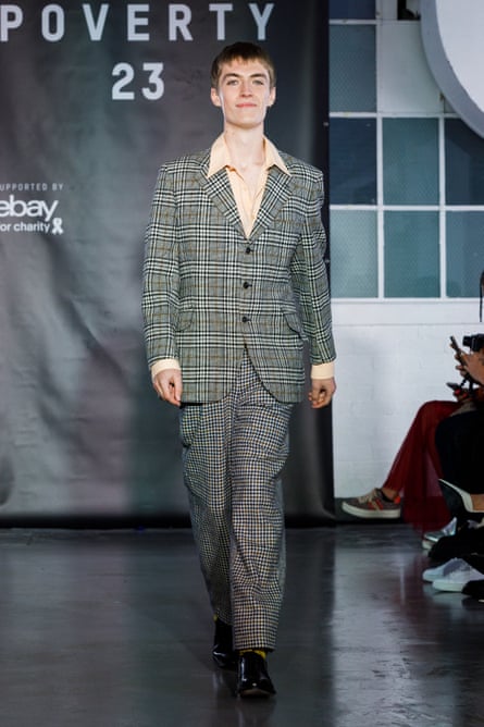 Francis Bourgeois models a two-piece chequered suit at Oxfam Fashion Fighting Poverty.