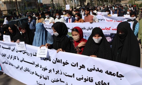 Afghans protest outside the Iranian consulate and demand justice for Afghans allegedly killed by Iranian security forces, in Herat, Afghanistan, on 11 May.