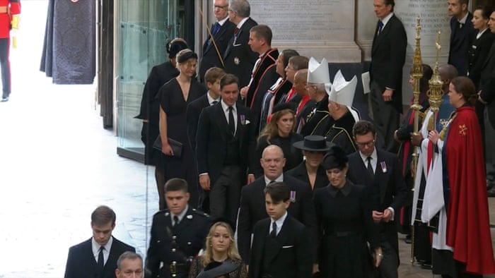 Members of the royal family, including some of the Queen’s grandchildren, arrive.