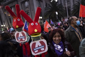 Santiago, Chile. People take part in a demonstration on the final day of voting in the referendum on a new national constitution