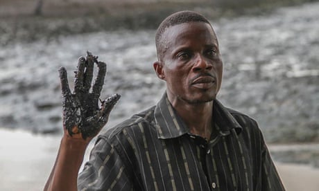 Eric Barizah chief of Nigeria’s Goi community in Rivers State shows oil pollution from leaks in the Niger delta.