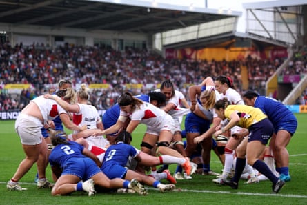 Lark Atkin-Davies goes over to score England’s sixth try.