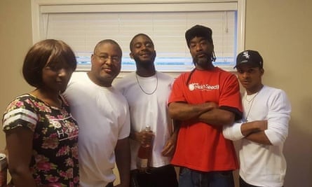 Clifford, second from left, with his niece, brother and nephews.