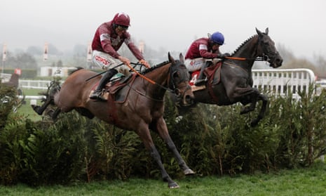 Tiger Roll (left) jumps the final fence marginally ahead of Delta Work but was beaten on the run-in in the Cross Country Chase at Cheltenham.