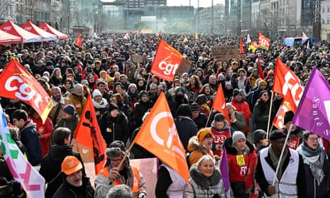 Demonstrators rally in Clermont-Ferrand, central France, as part of a 24-hour strike called by French trade unions in protest against a pensions overhaul.