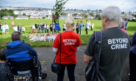 People observe a minute’s silence in memory of the five people shot dead in Plymouth by Jake Davison.