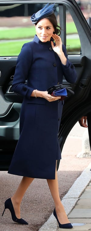 Power tailoring Meghan arrives at Eugenieâs wedding.