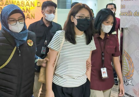 Alice Guo is escorted by immigration officers in Jakarta, Indonesia, in September 2024 prior to her deportation