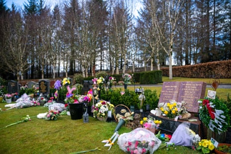 Floral tributes on the graves of victims in Dunblane Cemetery, Dunblane, Stirlingshire.