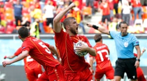 Stefan Ristovski (C) of North Macedonia celebrates his team’s first goal.