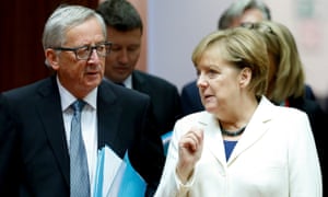 Jean-Claude Juncker and Angela Merkel discuss matters on day two of the EU leaders’ summit.