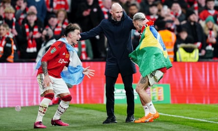 Erik ten Hag celebrates with Lisandro Martínez (left) and Antony.