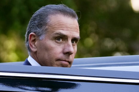 A middle-aged man steps into a car.