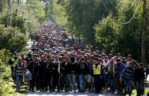 Migrants walk to Hegyeshalom on the Hungarian-Austrian border in September 2015.