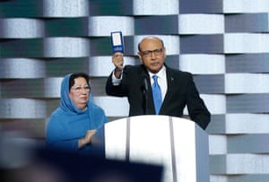 Khizr and Ghazala Khan, the parents of fallen soldier Humayun SM Khan, holding a copy of the US constitution on stage during the final day of the Democratic national convention