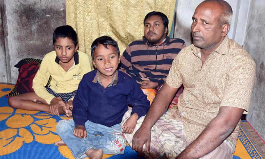 Fruit vendor Tofazzal Hossain with his two sons and grandson (second left) who have Duchenne muscular dystrophy. ‘They are suffering and have no hope of recovery,’ said Hossain.