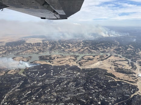Charred grasslands and burned cattle fencing