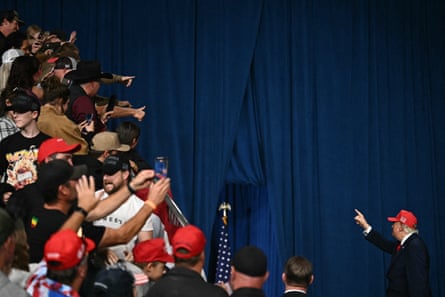Donald Trump points to the crowd
