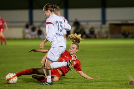 Jill Roord slides in to tackle Kristien Elsen in the Bene league opening game between Oud-Heverlee Leuven and FC Twente in August 2013