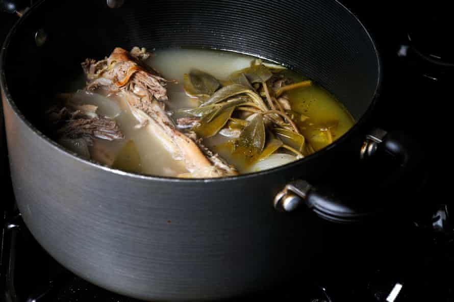 Turkey bones and onions and herbs making a stock