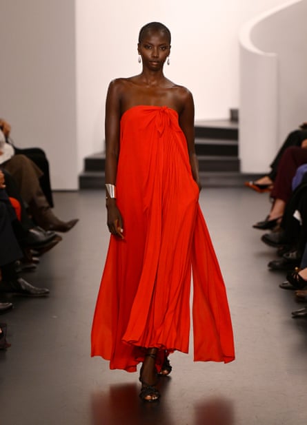 A crisp, flowing sundress in cheerful tomato red on the runway at the Ralph Lauren spring/summer 2026 show