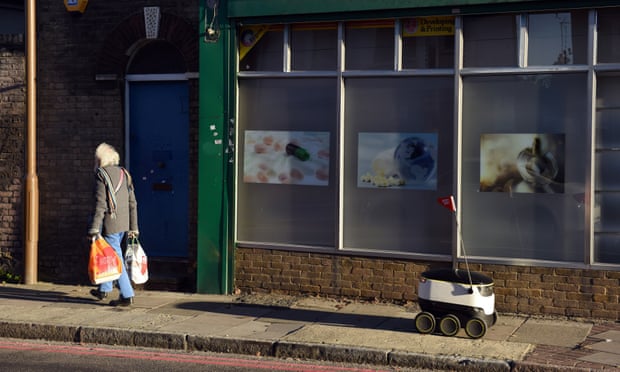 A robot delivering food for online ordering service Just Eat, on the street in Greenwich, London.