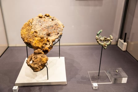 A rusted and corroded mirror on display at the museum