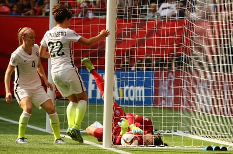 Hope Solo tries in vain to keep the ball out.